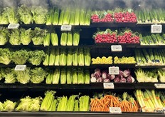 A wall of vegetables get the misting treatment.