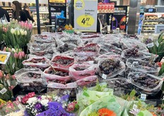 Red grapes get cozy with flowers as a Mother’s Day suggestion for shoppers.