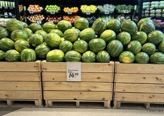 Large watermelons in bins are already sitting out on the retail floor.