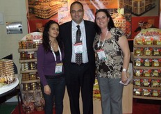 Amira . . a pioneer in importing speciality food products Miss Donia Kadari, Mr. Adel Boulos (vice president) and Lia Martone