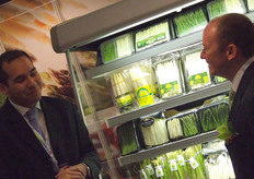 Gérald Lamuse discussing with one of the exhibitors.