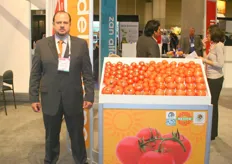 Ernesto Maldonado next to the tomatoes