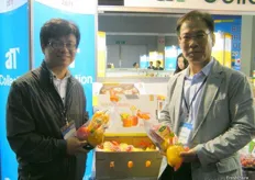 Mr.Young- So Jun from Exhibition Planning Dept. and Mr.Young- Do Kim of Agricultural Trading, Dept. Manager, Gyeong Nam Trading Inc.