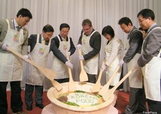 preparing Bibimpap, a famous Korean dish.. this represents their strong relationships