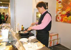 Quali´s managing director, Say- Han Kim, preparing stir fry mushrooms to taste