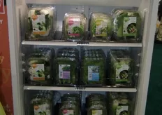 Fresh Direct displays different vegetables with cook instructions at the back.