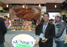 Paul Mastronardi proudly holds the Angel Sweet and Twister Pepper, two new sweet varieties under the Sunset label. www.sunsetproduce.com