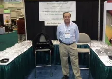 Kurt Zuhlke from Produce Packaging displays his assortment of clamshells and other packaging. www.producepackaging.com