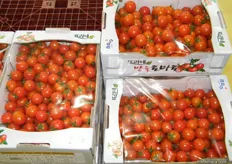 cherry tomatoes being sold for 2kg/box