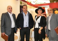 Mbarek Blileg (2nd frm the left) with associates at the Fresh Fruit stand- Morocco