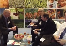 The guests at the UK pavilion enjoying a drink and a snack.