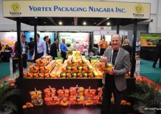 Philip Short from Vortex Packaging holding his packaging that won the award last year. Now they use it for various fresh produce like citrus.