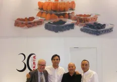 Adolfo Gomis Mir, General Director of Infia Ibéric, next to his commercial team, displaying their plastic containers for fruit.