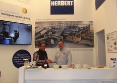 Adrian Head (right), at Herbert promotes the new Centurian machine which replaces the vertical box tipper, it has less maintenance and great product handling.