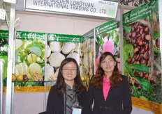 Sheena Xie and Christy Zhu of Jining Golden Longyuan.. the main products are garlic, ginger, apple, pear, pomelo, chestnut