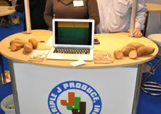 "Kristi and Joey Hocutt from Triple "J" Produce promote their sweet potatoes"