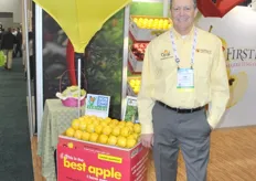 Tim Cavanaugh of FirstFruits Marketing promoting the Opal apple. This third production year they sold 200,000 boxes. They are planning to have more acres and within five years they are aiming at sales of 1,000,000 boxes of apples.