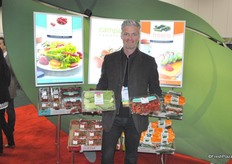 John Newell from Windset with strawberries and Bok Choy, the two new items.