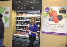 Janis McIntosh from Naturipe. They have strawberries in a pink packaging with stem. There are going 10 strawberries in a pack. The pink color has been chosen for days like Valentine, Mother's Day and Pink Ribbon.