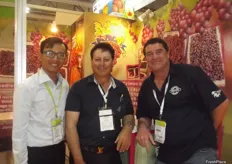 At the Aussie Fruit Connection stand - Gary Wan with Luigi Ingaliso from LTI Vineyards and Glenn Collihole from Wakefield Transport.
