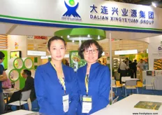 Alina Gao with Amanda Du, Deputy General Manager of Dalian Xing Ye Yuan Group, distributes fruits to over 600 supermarkets in China - Dalian, China