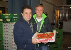 Friedriech Hermanns with his own tomatoes. Pictured here with Ilias, who also has a magazine on the market