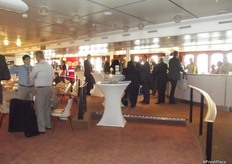 Delegates gather for coffee.