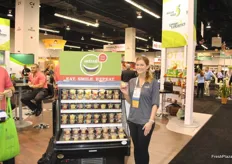 "Bre Engel from Tom Lange holds a cup with "actual produce". A new brand with selected fruit which is doing very well at Target. The line contains out of 6 different cups with fruit."