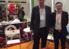 Philip Webley at the Cherry Growers Australia stand with and Dr Bin Lu from State Government of Victoria.