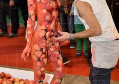 During the body painting performace.