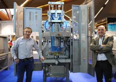 Joan Phillips and Mathieu Truijen of VH Verpakkingsmachines. They were at the De Bruyne Food Processing stand with this vertical vacuum packaging machine. The machine packages 5 to 10 kg potatoes, but also other fruit and veg.