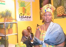 representative at the Ghana Pavillion wearing the traditional dress