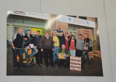 A photo of the whole Karl Klees GmbH team is shown in the market hall.