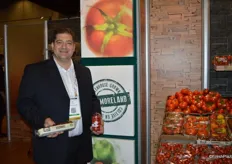 Dino Dilaudo of Westmoreland Sales showing a wide variety of tomatoes.