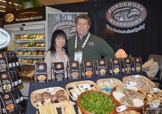 Lyn Luu and Joe Salvo with Ponderosa Mushrooms. Beautiful white asparagus on display in the booth.