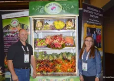 Jeff Lundberg and Rocio Munoz from Babe Farms proudly showing a selection of the company's many specialty vegetables. Cone head cabbage is the company's latest introduction.