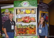 Jeff Lundberg and Rocio Munoz from Babe Farms proudly showing a selection of the company's many specialty vegetables. Cone head cabbage is the company's latest introduction.