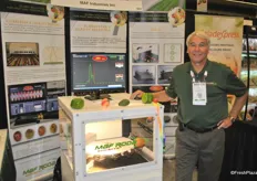 Denny Bilton from MAF Industries promotes the IDD2, which can detect internal damage in apples.