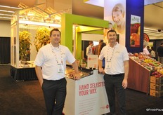 Chris Veillon and Peter Quiring from Nature Fresh Farms proudly show the Tombar. At the back they also have their greenhouse.