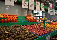 Truly a beautiful stand with a large selection of fresh produce. Customers were invited to try fruit prior to purchase.