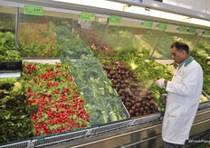Spraying with water to make the vegetables look fresh