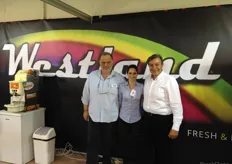 The people from Westlandfruit. In the middle Abastasua Archontaki and on the left her father Emmanuel Archontakis. Westlandfruit has two factories for their own production of citrus and avocado. They export to the Balkan countries, Denmark and Russia.