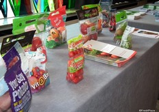 Promotional table showcasing product packaging.