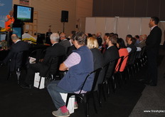 Attendees listening to a presentation by Phil Lyons of FALCON UAV.