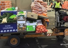 These little wagons are all over the market, the traders use them to move the produce from the stand to the buyer's truck. These are diesel powered and will not allowed at the new market.
