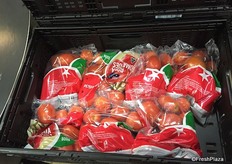 Bags of roma tomatoes.
