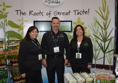 Erika Unruh, Jim Fox and Suzette Overgaag representing North Shore living herbs. The company sells 23 herb varieties with the roots attached.