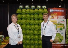 Renee Cooper and Pete Overgaag from Holland Produce in front of their butter lettuce display.