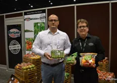 Max Mastronardi and Matt Wright from TopLine Farms Westmoreland Sales proudly show the company's mini cucumbers and mini peppers.