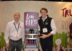 Huw Griffith and George Shropshire with LoveBeets, showing beet juice and other beet products on display.